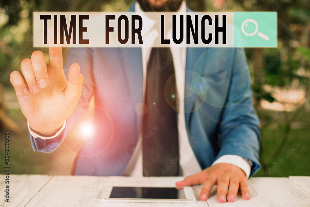 Conceptual hand writing showing Time For Lunch. Concept meaning Moment to have a meal Break from work Relax eat drink rest Businessman with pointing finger in front of him Conceptual hand writing showing Time For Lunch. Concept meaning Moment to have a meal Break from work Relax eat drink rest Businessman with pointing finger in front of him