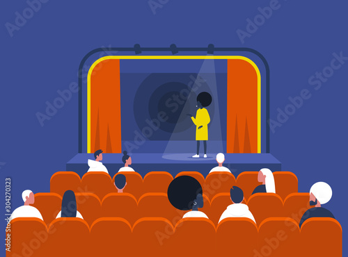 Entertainment and culture, Stand up comedy show, Young black female artist performing on stage and Audience sitting in a vintage theatre with old fashion interior