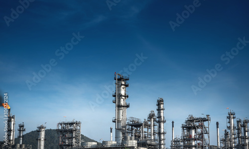 Close up Industrial view at oil refinery plant form industry zone with sunrise and cloudy sky