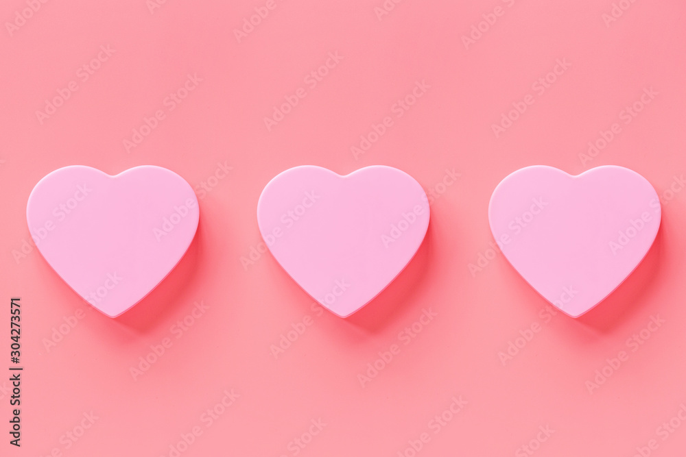 Valentine's day background with pink hearth. Flat lay, top view, mockup, template, copy space. Minimal abstract composition for 14 February celebration