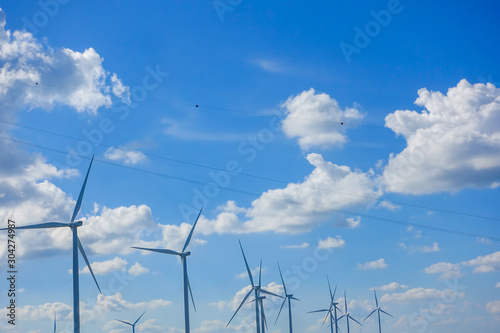 Wind turbine with blue sky. Wind energy. Clean energy © Sawai Thong