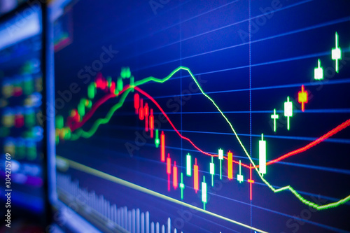 Blue stock exchange market graph on LED screen for business analysis. Finance and economic graphs.