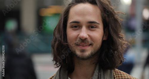 Young caucasian man in city face portrait