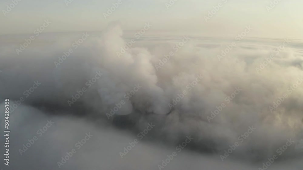 Flying over the evening clouds with the late sun. Flying over the evening clouds with the late sun.