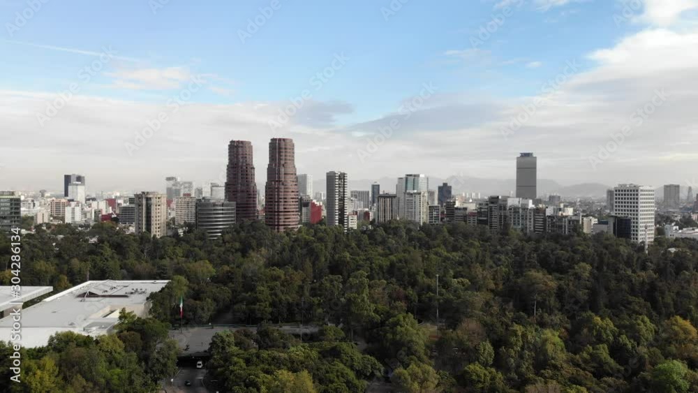 Aerial view of the Polanco Skyline at sunrise. Drone flying forward with a blue and cloudy sky Aerial view of the Polanco Skyline at sunrise. Drone flying forward with a blue and cloudy sky