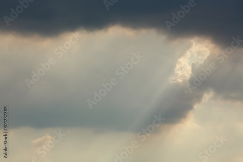 sunlight through cloud on dramatic sky after the rain © sutichak