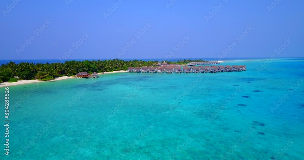Idyllic island for young couples that want to spend honeymoon on luxurious bungalows over clam clear lagoon in Maldives Idyllic island for young couples that want to spend honeymoon on luxurious bungalows over clam clear lagoon in Maldives