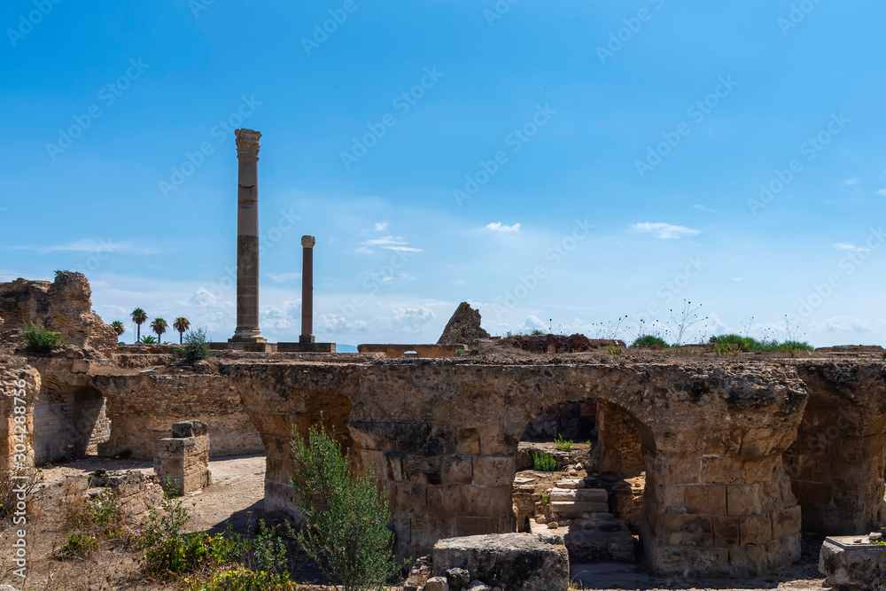 ruins of stone walls at the archaeological site of the ancient city of Carthage