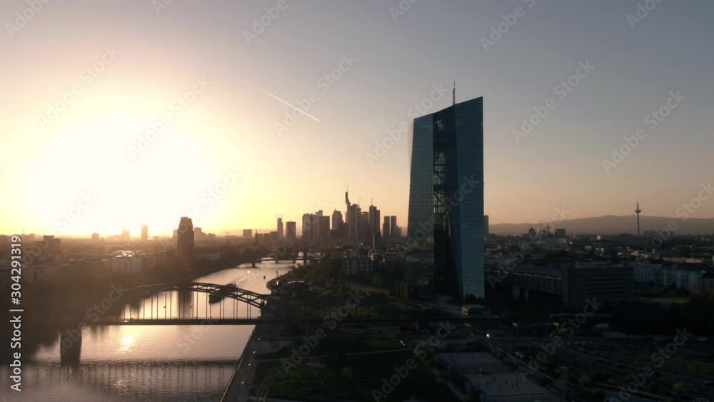 Frankfurt ECB Skyline Aerial Shot at sunset reflecting sun