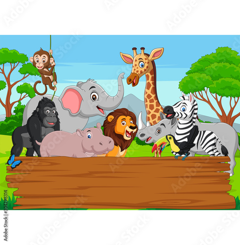 Fototapeta Naklejka Na Ścianę i Meble -  Cartoon wild animal with blank board in the jungle