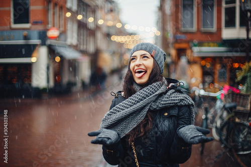 female tourist walking around and exploring Amsterdam Netherlands