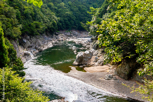 Katsura River and valley landscape. Arashiyama, Nishikyo-ku, Kyoto-shi, Kyoto	 photo