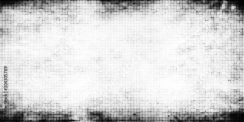 Old grunge dotted background. Abstract distress frame. Halftone effect dots. Vector template for business and graphic designs.