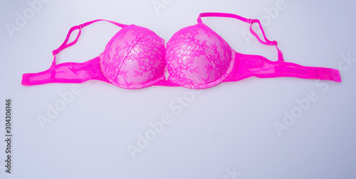 bra or pink colour bra on white background.