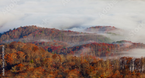 Impressive sea of clouds at sunrise, in the Appalachian Mountains, on a beautiful autumn day