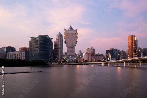 Image of Macau (Macao), China. Skyscraper hotel and casino building at downtown in Macau (Macao). Asian tourism, modern city life, or business finance and economy concept.