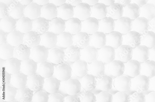 Fototapeta Naklejka Na Ścianę i Meble -  White soft light texture of heap transparent balls as elegant modern abstract background.