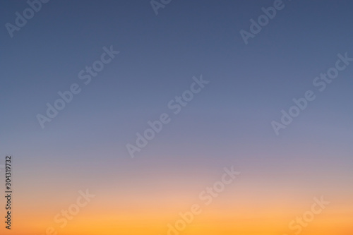 Vector gradient background, Natural colors. Sunset in the sky with blue, Orange and red dramatic colors © AungMyo