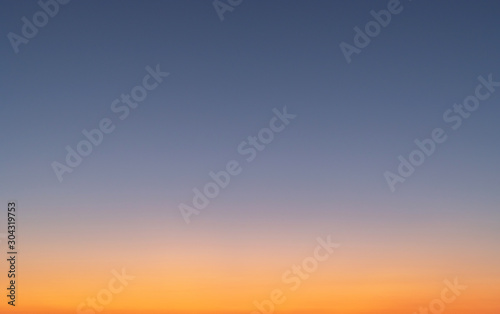 Vector gradient background, Natural colors. Sunset in the sky with blue, Orange and red dramatic colors © AungMyo