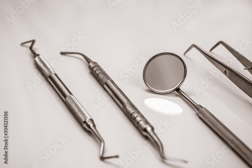 Set of metal dental instruments for teeth dental care