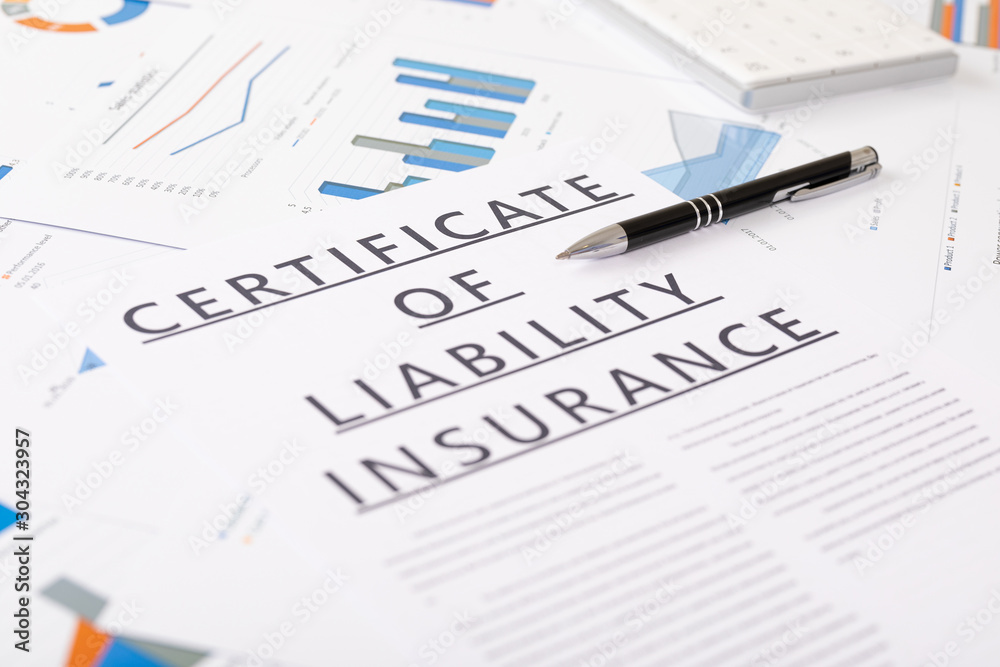 certificate of liability insurance concept , documents on the desktop certificate of liability insurance concept , documents on the desktop