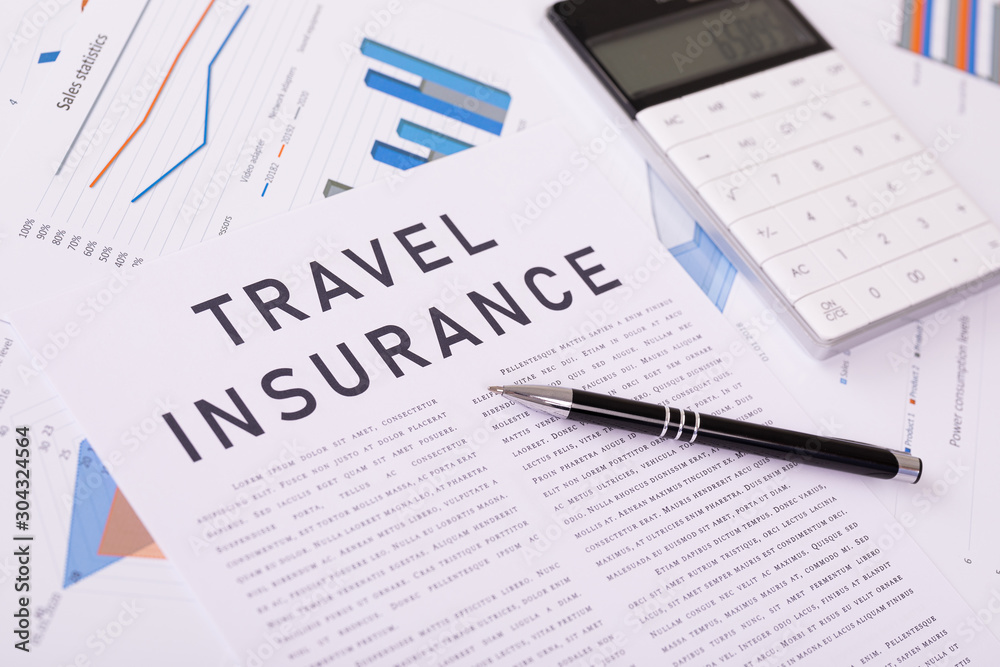 travel insurance concept, documents on the desktop travel insurance concept, documents on the desktop