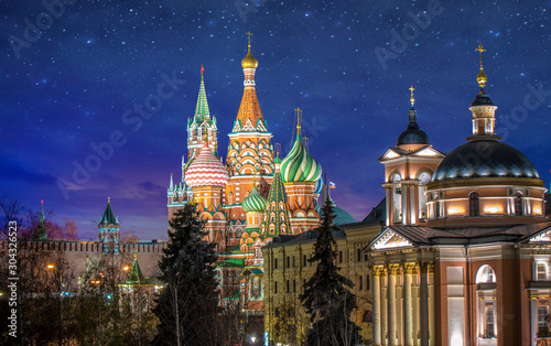 The Cathedral of Vasily the Blessed known as Saint Basil's Cathedral, is a Russian Orthodox church in Red Square in Moscow, Russia. Beautiful blue star night view  © mitzo_bs