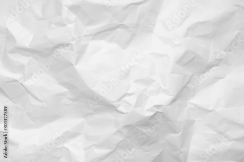 White crumpled paper texture background.