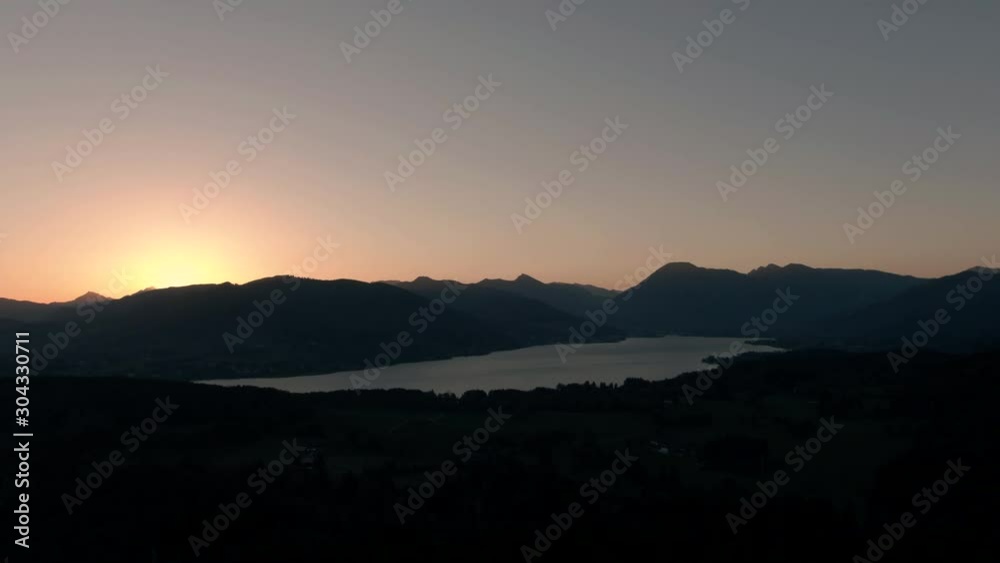 Aerial view of Chiemsee lake bavaria sunrise over the mountains with beatiful lensflare Aerial view of Chiemsee lake bavaria sunrise over the mountains with beatiful lensflare