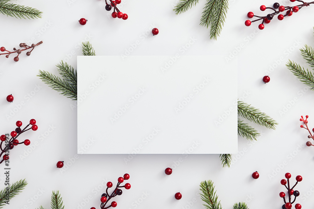 Evergreen tree branch and red berries - obrazy, fototapety, plakaty 
