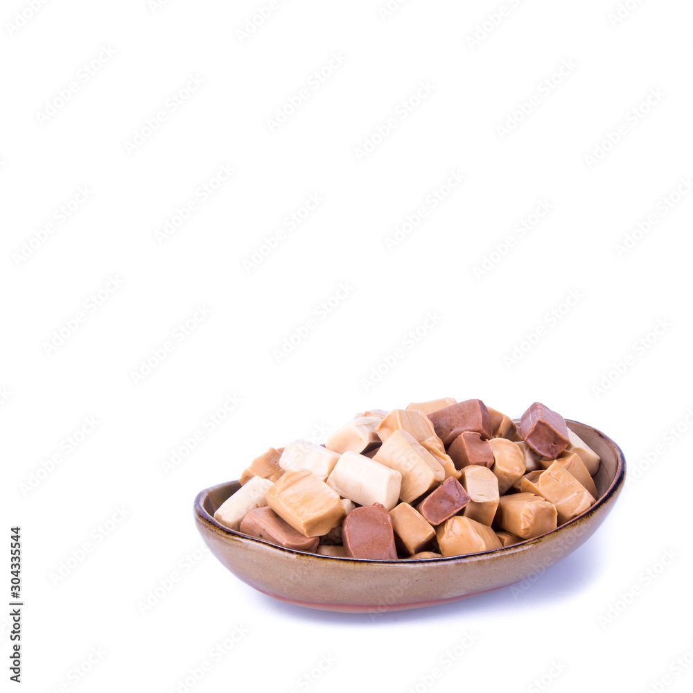 candies or caramel candies on a white background. candies or caramel candies on a white background.