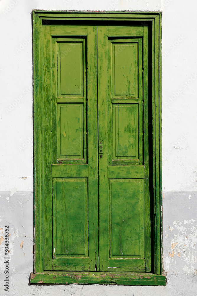 Green old charming door in Tenerife