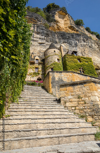 A majestic stone staircase in La Roque-Gageac a charming town in the Dordogne valley. France