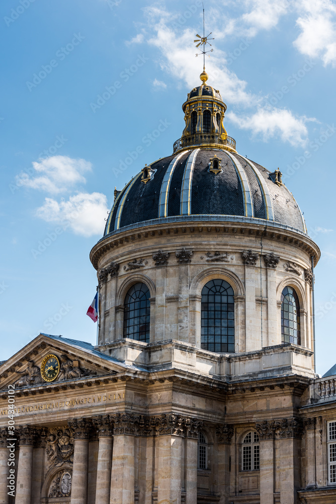Dome of The Institut de France at the bank of Seine River, Paris. A French learned society, grouping five academies, the most famous of which is the Academie francaise