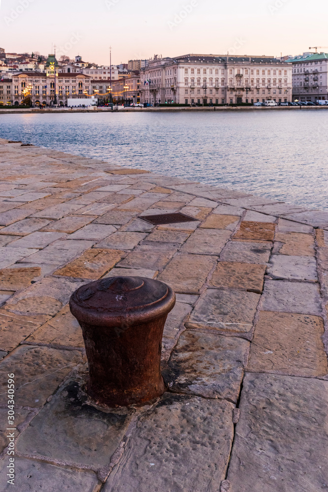 Sunset from the Audace pier of Trieste. Colors of fire on the water. Italy Sunset from the Audace pier of Trieste. Colors of fire on the water. Italy