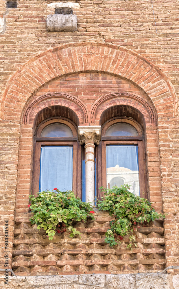Traditional bifora window with reflection Traditional bifora window with reflection