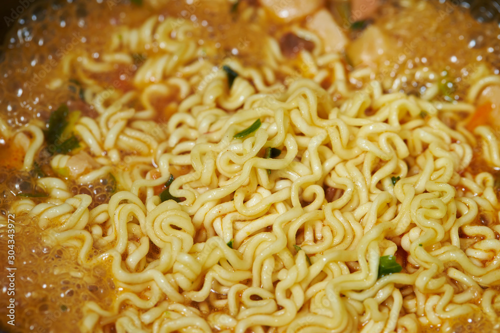 Cooking instant ramen noodle in pot Cooking instant ramen noodle in pot