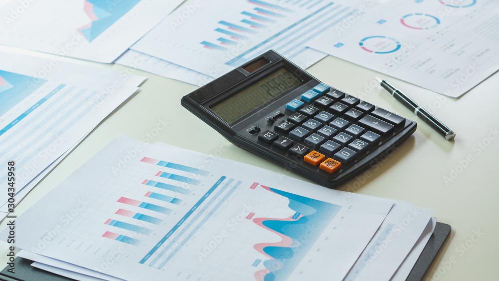 businessman working calculate data document graph chart report marketing research development planning management strategy analysis financial accounting. Business office concept. businessman working calculate data document graph chart report marketing research development planning management strategy analysis financial accounting. Business office concept.