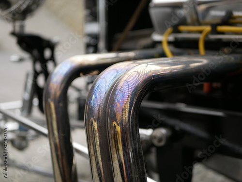 shiny exhaust pipe of the car changed color due to the high exhaust gas temperature