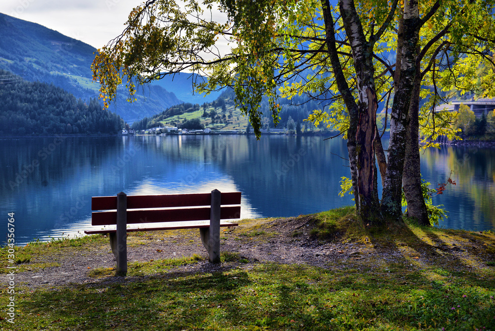 beautiful view of a mountain lake in the autumn sunny day. Poschiavo, Switzerland