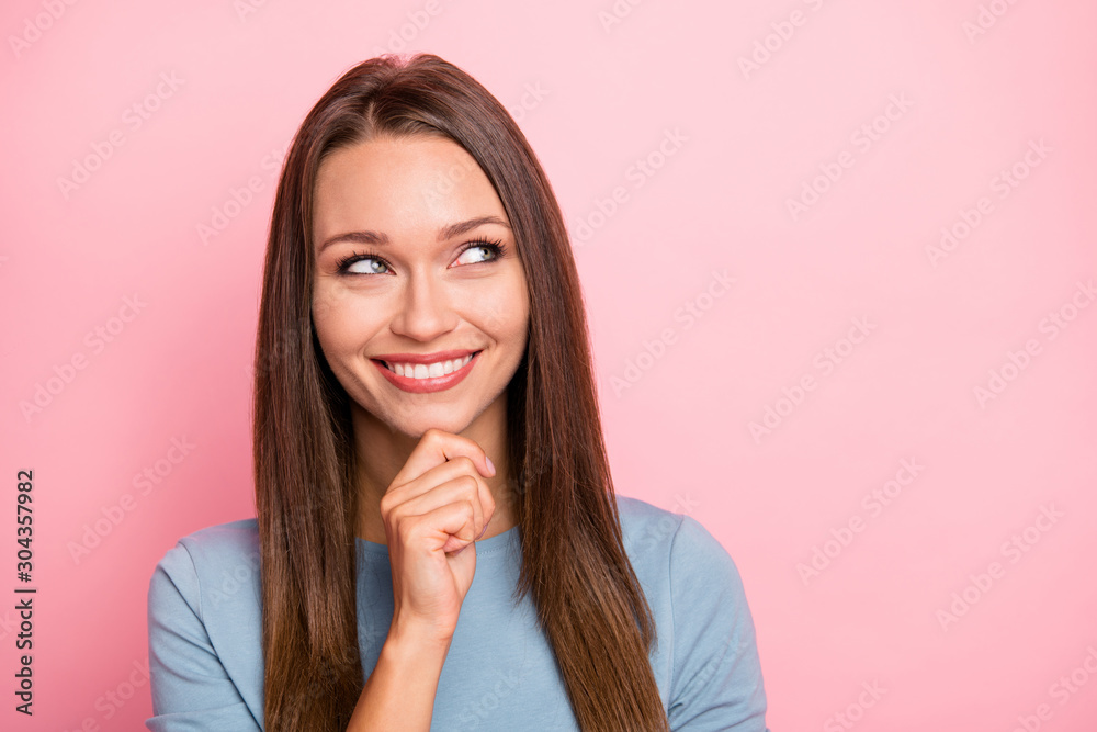 Close up photo of cheerful positive cute pretty girl touching her skin planning how to joke at her friend isolated pastel color backgound Close up photo of cheerful positive cute pretty girl touching her skin planning how to joke at her friend isolated pastel color backgound