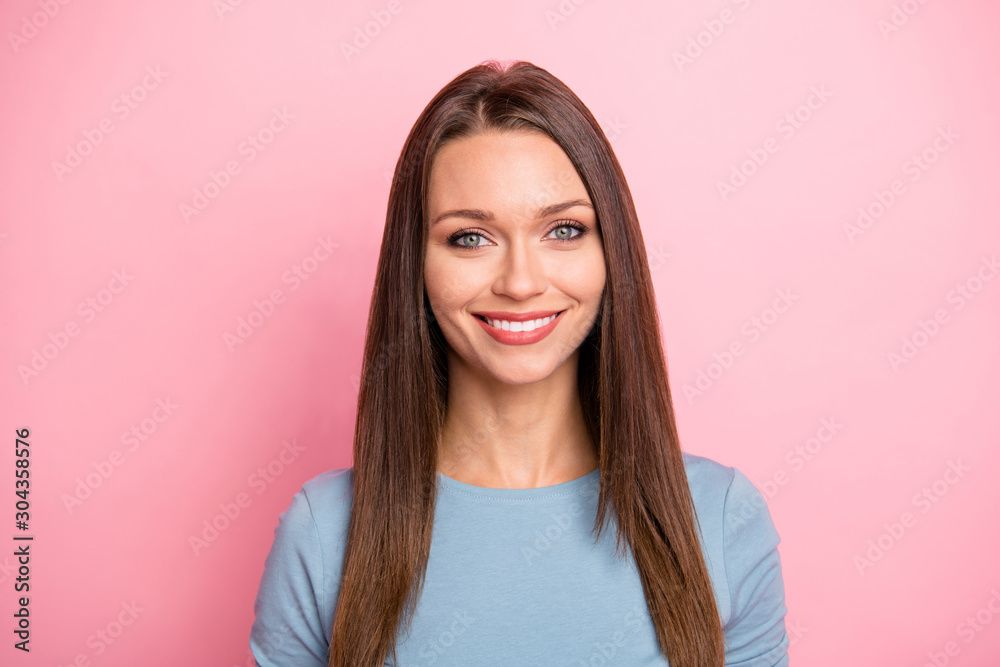 Portrait of cheerful toothy girlfriend looking into camera isolated over pastel color background