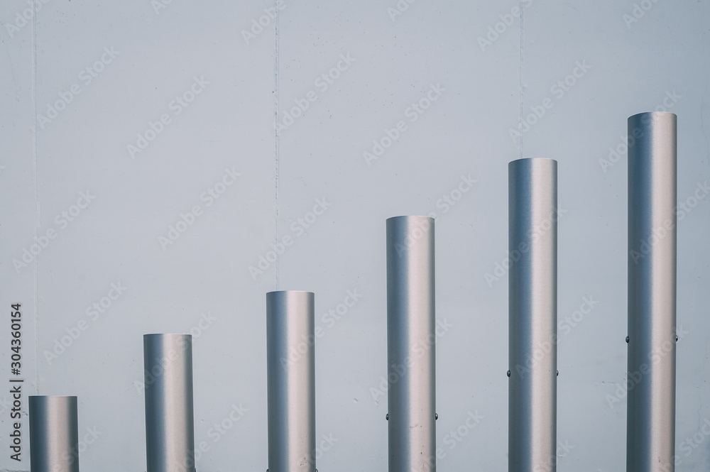 stainless steel vertical poles placed on steps