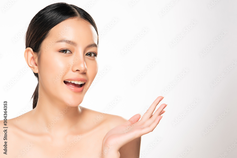 Beautiful Young Asian Woman with Clean Fresh Skin. Face care, Facial treatment, on white background, Beauty and Cosmetics Concept. Beautiful Young Asian Woman with Clean Fresh Skin. Face care, Facial treatment, on white background, Beauty and Cosmetics Concept.