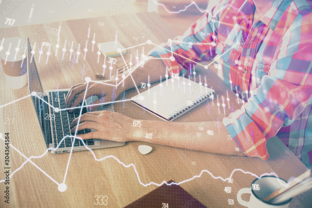 Multi exposure of forex graph with man working on computer on background. Concept of market analysis. Multi exposure of forex graph with man working on computer on background. Concept of market analysis.