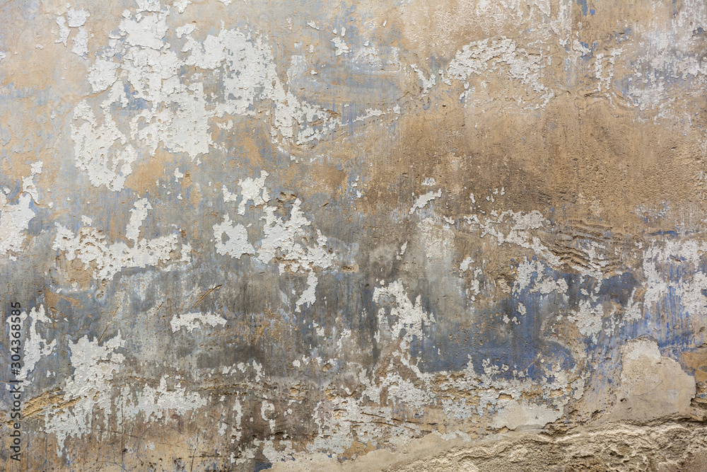 Fototapeta premium Background weathered grey concrete wall with peeled off paint
