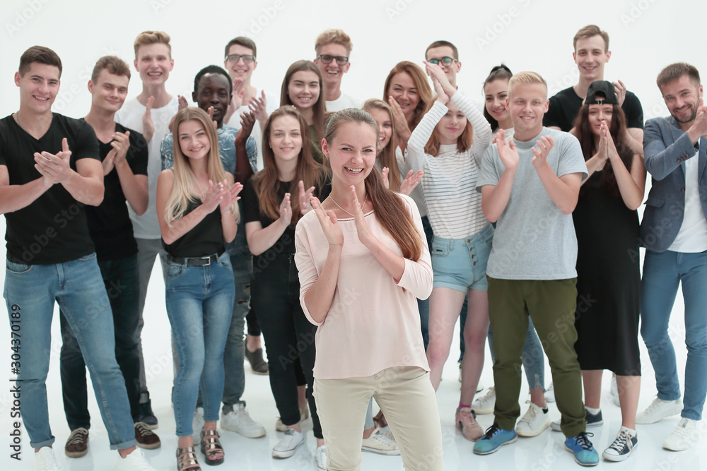 team of happy young people applauding together