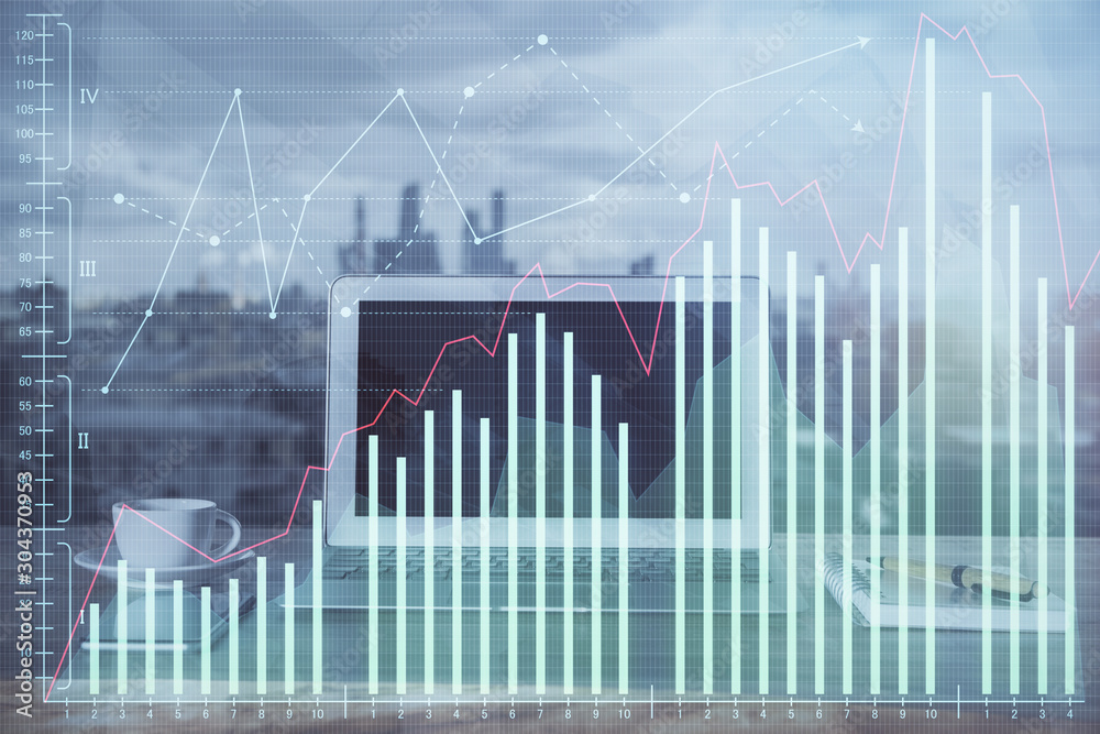 Financial market graph hologram and personal computer on background. Multi exposure. Concept of forex. Financial market graph hologram and personal computer on background. Multi exposure. Concept of forex.