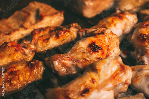 Chicken wings prepared on the grill during a barbecue