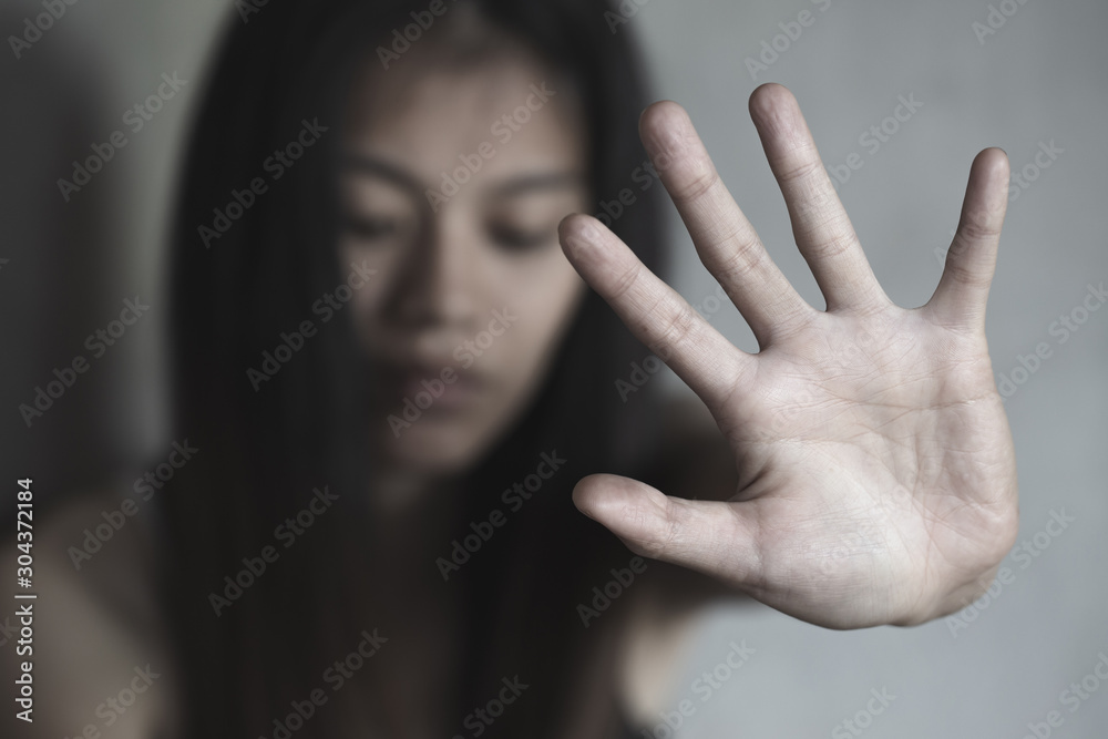 Woman bondage in angle of abandoned building image blur , stop violence against Women, international women's day Woman bondage in angle of abandoned building image blur , stop violence against Women, international women's day